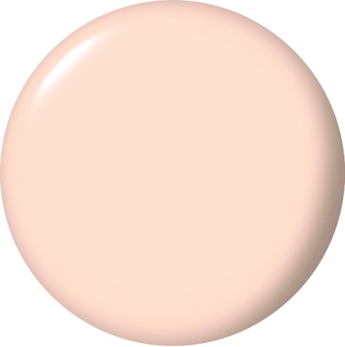 En rund, lys beige sminkeekse med en glatt, matt overflate.