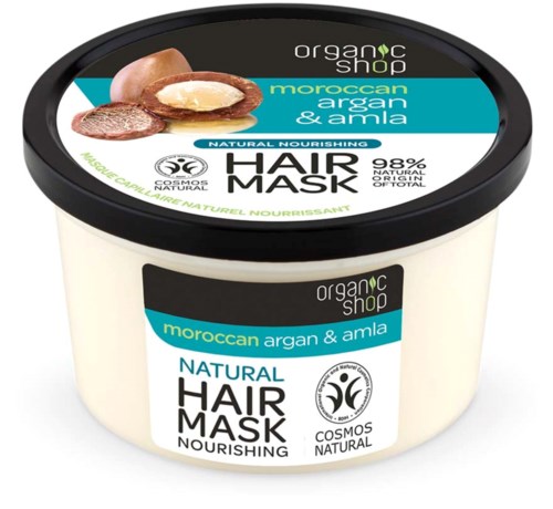 En burk med hårmask med marockansk argan och amla för näring till håret. Svart lock, vit burk och färgglad etikett.