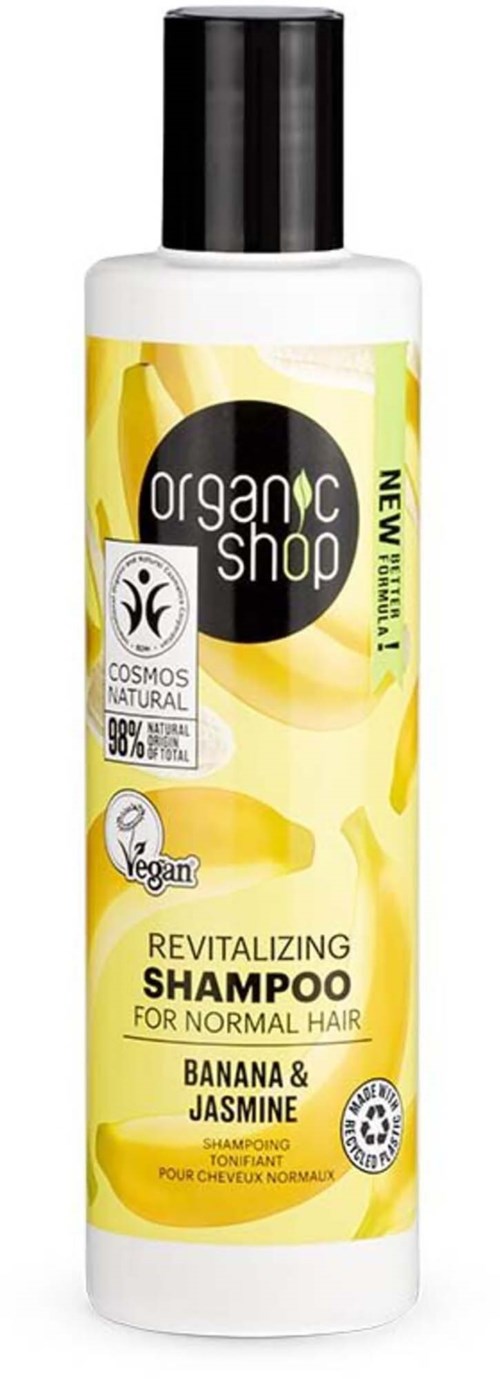 A bottle of Revitalizing Shampoo with banana and jasmine, suitable for normal hair, from Organic Shop.