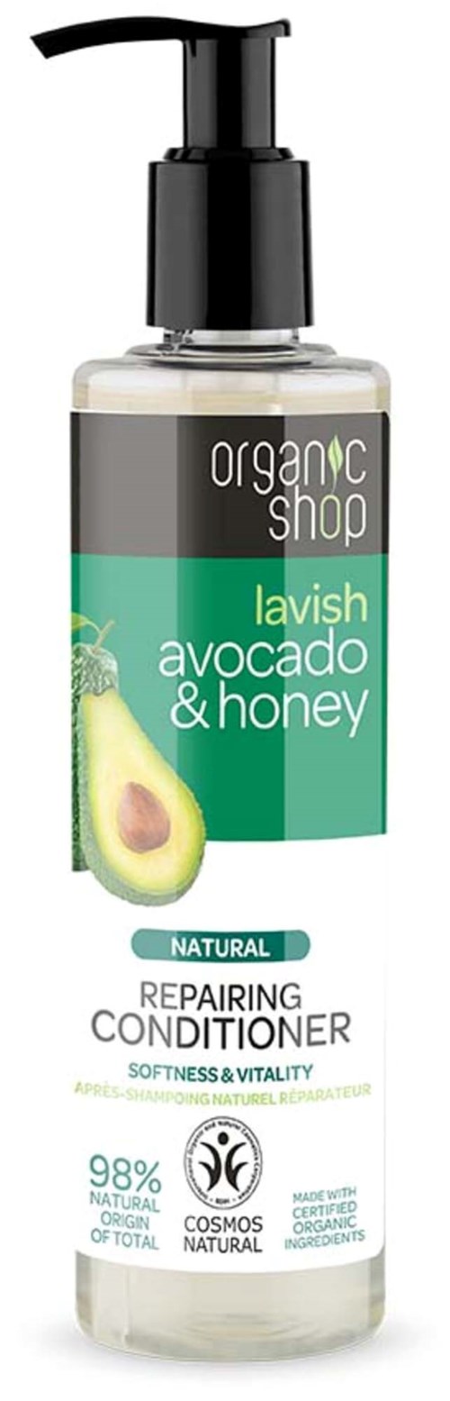 En flaske med økologisk avocado og honning reparasjonsbalsam med pumpe og etikett som viser en avokadoskive.