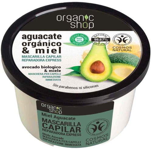 En svartlockig behållare med etiketter om organisk avokadohonung hårmask, nämner naturliga ingredienser och omedelbar reparation.