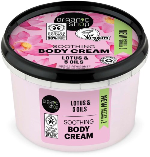 A round container of soothing body cream with pink lotus flowers, vegan and organic labels, and new herbal formula.