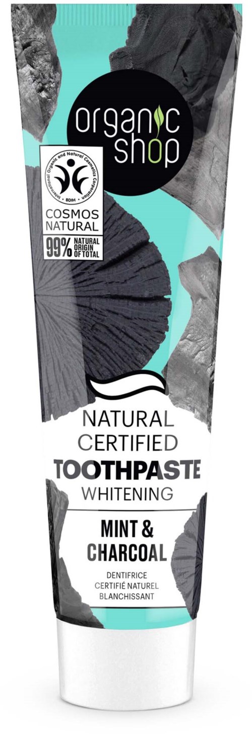 A tube of natural, certified whitening toothpaste with mint and charcoal, eco-friendly, and 99% natural ingredients.