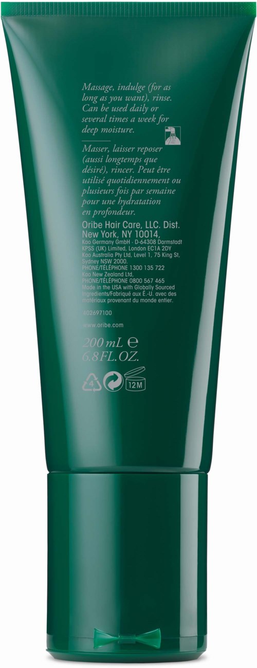 Grön tubförpackning med vit text, sannolikt en kosmetisk eller groomingprodukt.