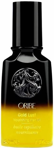 Eine schwarze und gelbe Flasche mit Oribe Gold Lust nährendes Haaröl, rundes Logo und Text.