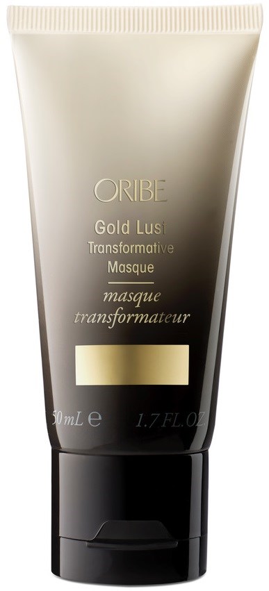 Eine Tube mit ORIBE Gold Lust Transformative Masque in Gold und Schwarz mit Produktbeschreibung.