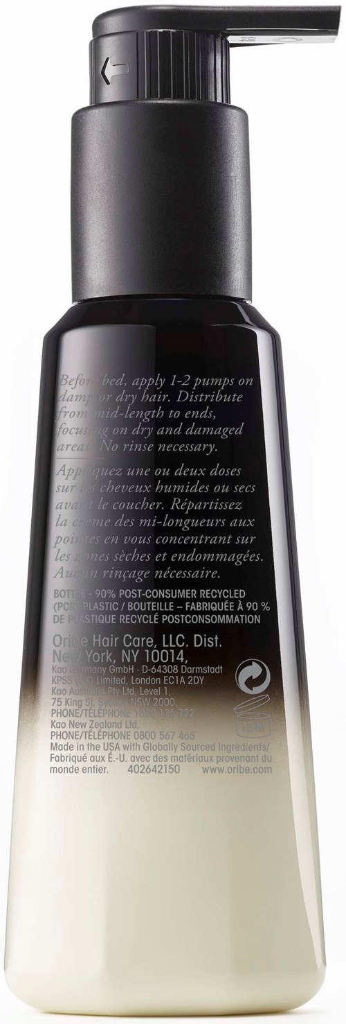 Eine schwarze und weiße Flasche mit Pumpe, wahrscheinlich eine Seifen- oder Lotionspender.