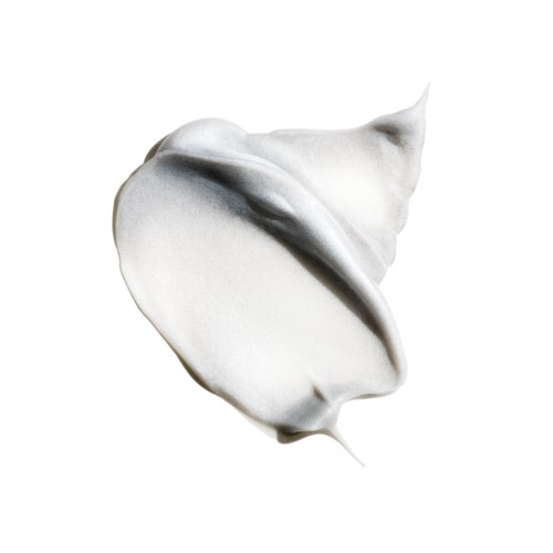 Een draai van witte crème of lotion met een spits puntje en gladde textuur. Het ligt op een effen witte achtergrond.
