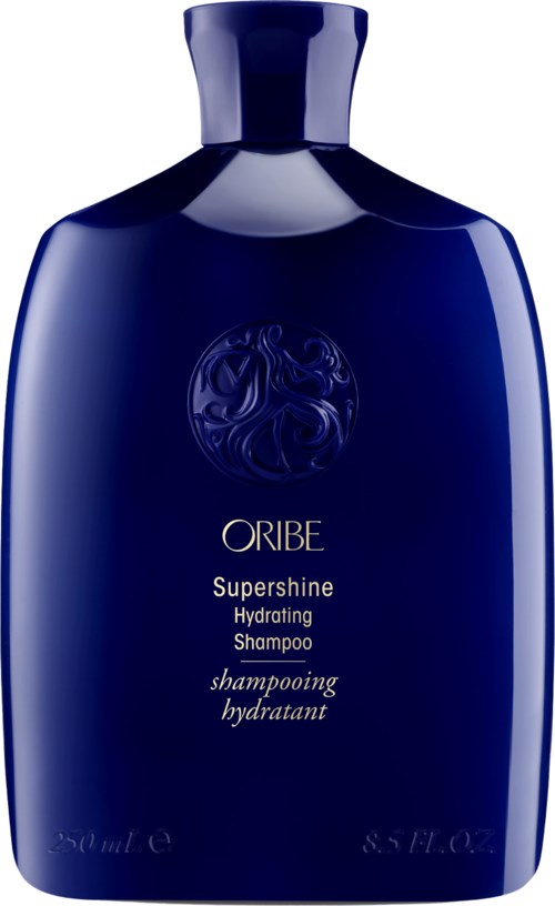 Dunkelblaue Flasche mit Oribe Supershine feuchtigkeitsspendendes Shampoo, elegantes Design und Logo.