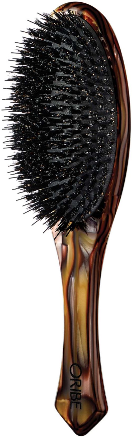 A hairbrush with a wooden handle and black bristles, labeled 'ORIBE' on the handle.