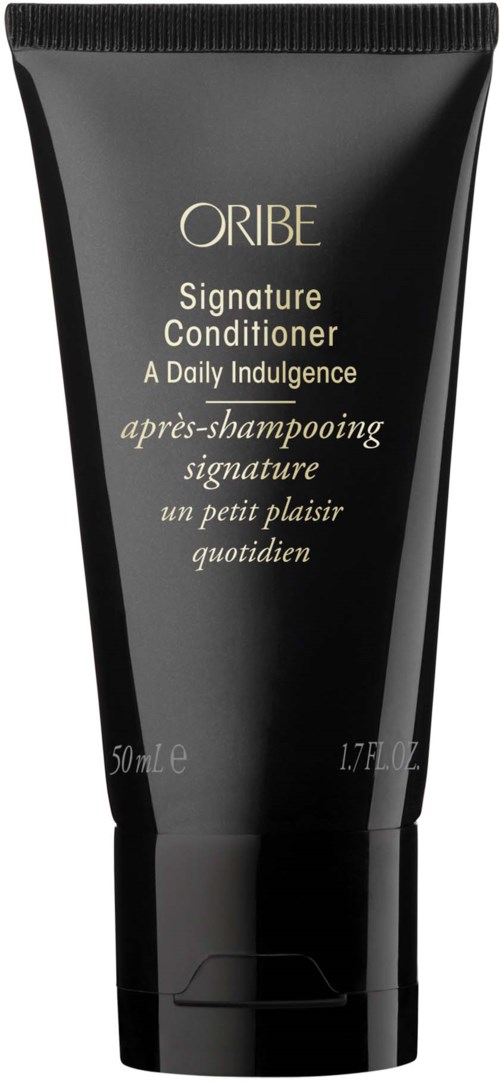 Eine schwarze Tube mit goldener Schrift, beschriftet Oribe Signature Conditioner, 50 ml, für den täglichen Gebrauch.