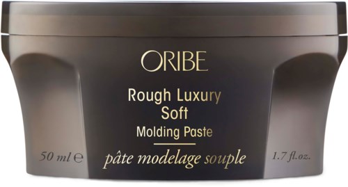 Ein kleiner Behälter mit ORIBE Rough Luxury Soft Molding Paste, 50 ml, in dunklem Grau und Schwarz.