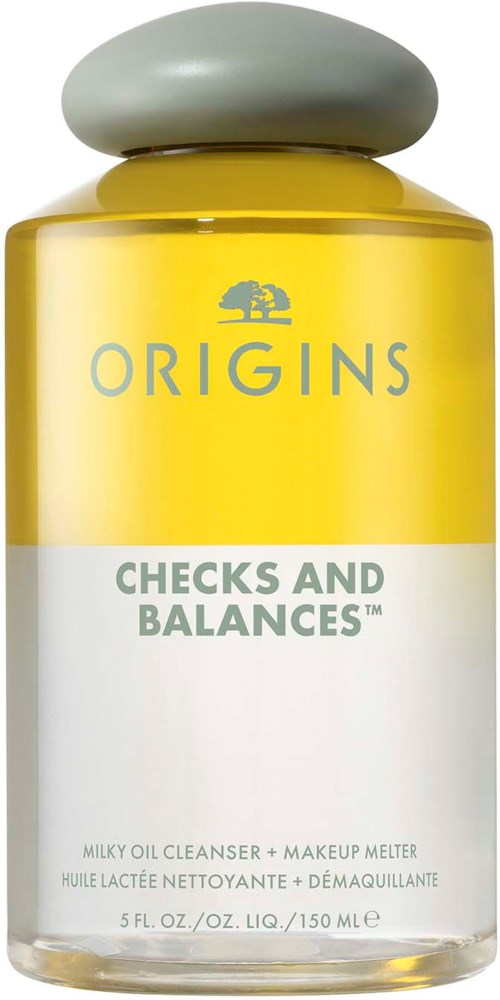 A yellow bottle with silver cap, labeled 'Origins Checks and Balances' for skincare.
