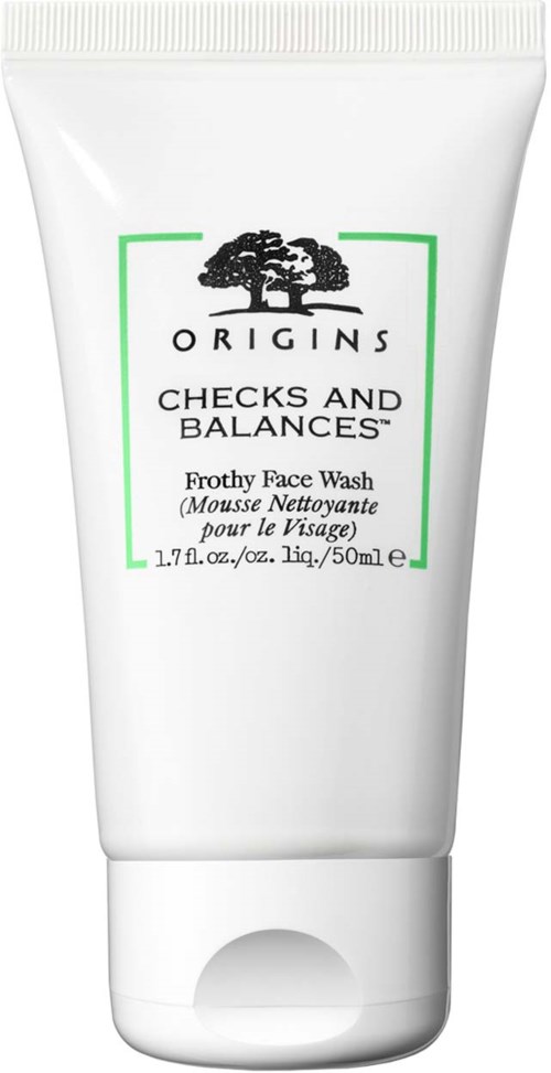 A white tube of Origins Checks and Balances Frosty Face Wash with a black tree logo and green outline.