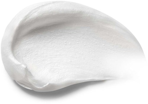 A blob of white cream or lotion with a smooth, thick texture on a black background.