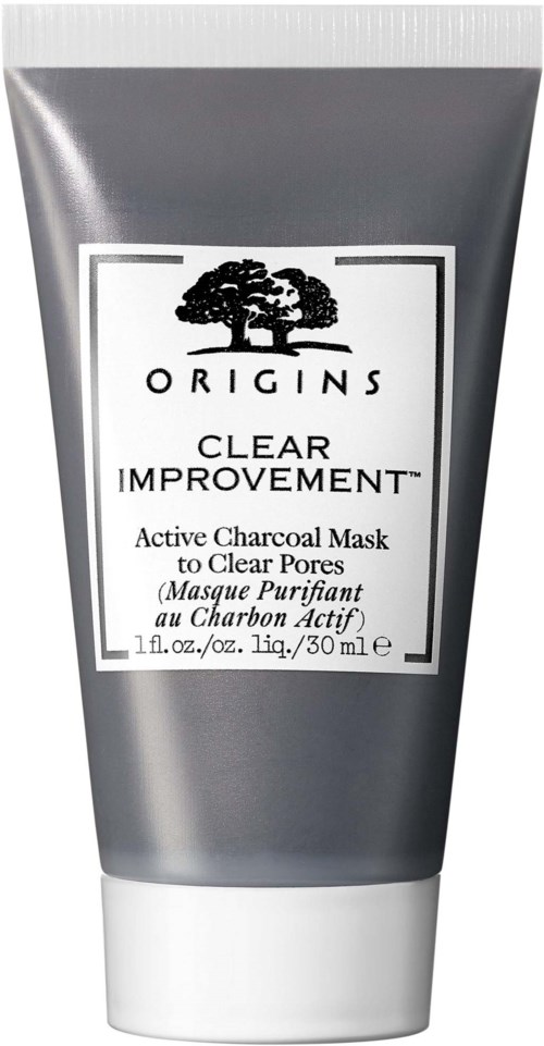 A gray tube of active charcoal mask with a black tree logo and white label highlighting its purpose.