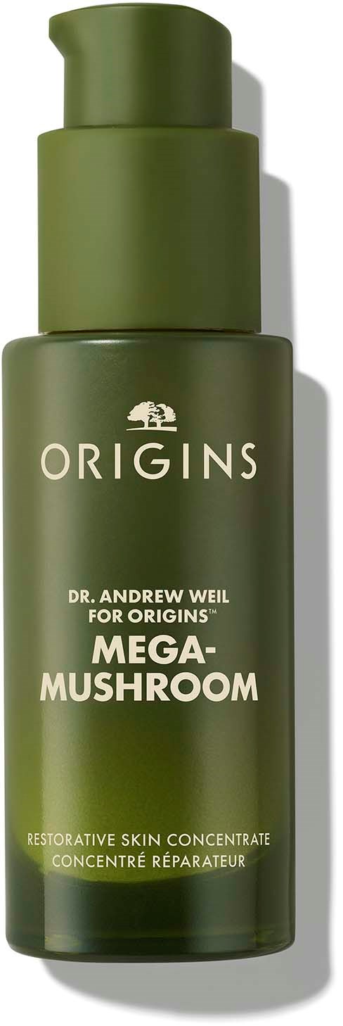 Grüne Flasche mit Aufdruck 'Origins Mega-Mushroom' für Hautpflege, mit Pumpenspender.