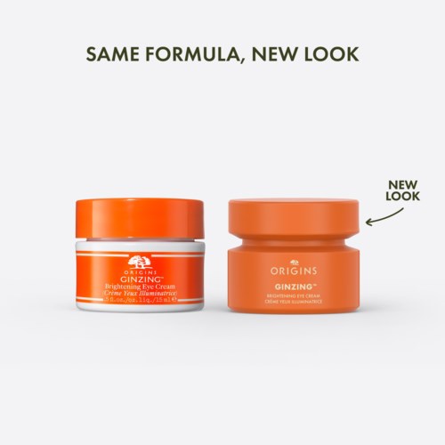 Zwei orangefarbene Gläser mit Origins GinZing Augencreme, eins mit neuem Look, eins alt, nebeneinander.