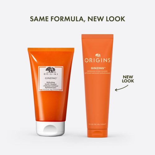 Zwei orangefarbene Tuben mit Hautpflegeprodukten, eine mit 'Refresh Scrub Cleanser' beschriftet, rechts steht 'New Look.'