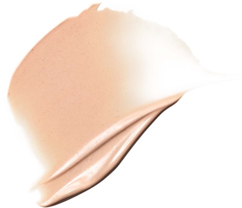 A smear of light beige or peach-colored makeup or cream with a smooth texture.