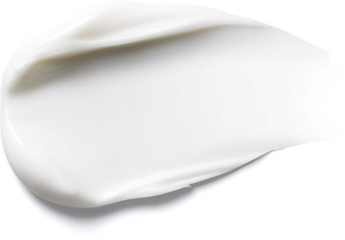 Ein Klecks weiße Creme oder Lotion auf weißem Hintergrund.