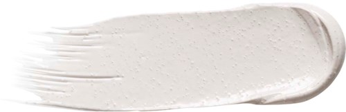 Weiße Creme auf schwarzem Hintergrund.