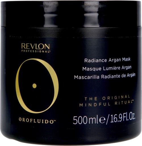 A black jar labeled Revlon Radiance Argan Mask with gold and white text, and a large gold circle design, holding 500 ml.