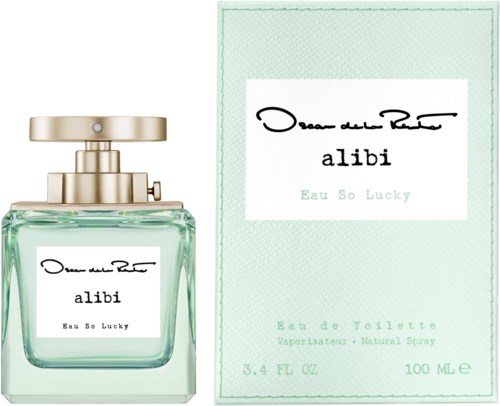En parfymflaska och en förpackning, båda märkta 'alibi Eau So Lucky', är ljusgröna med guldaccenter och enkel text.