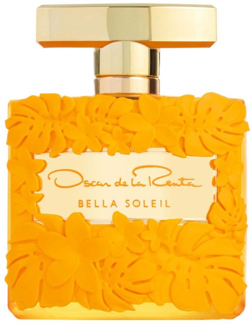 En parfymflaska med gul blomsterdesign, guldkork och vit etikett. Den står 'Oscar de la Renta Bella Soleil.'