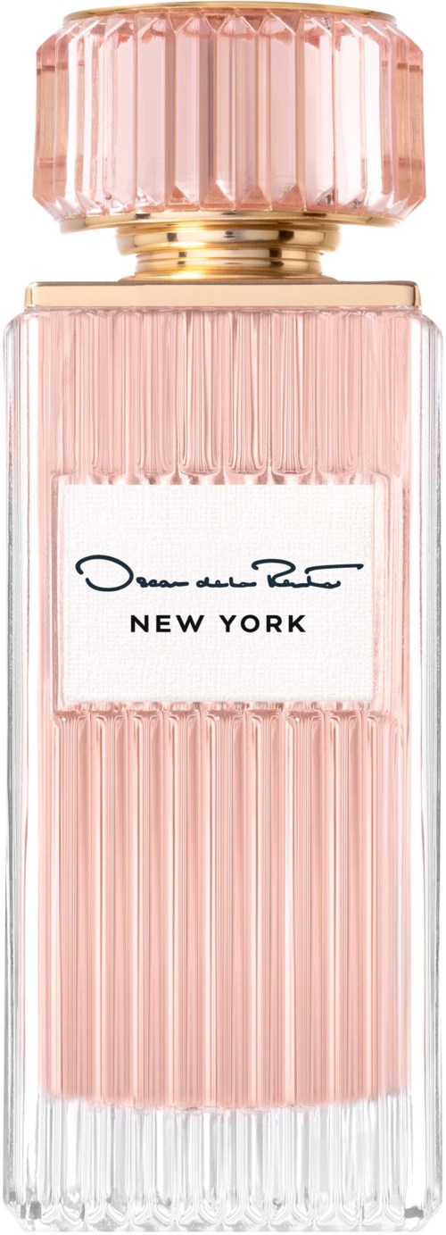 En rosa parfyllflaska med ribbad design och en vit etikett som säger 'NEW YORK' och en underskrift.