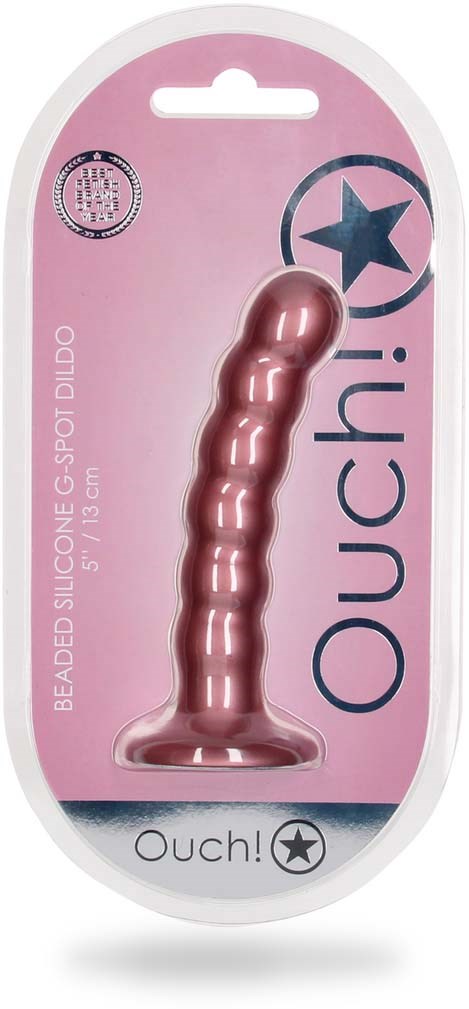 Rosa Silikon-Dildo mit strukturierter, gebogener Form in rosa Verpackung mit blauer und schwarzer Schrift sowie Sternlogo.