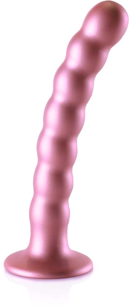 Ein pinkfarbenes, dildo-ähnliches Objekt mit mehreren runden Erhebungen, stehend auf einer flachen Basis.