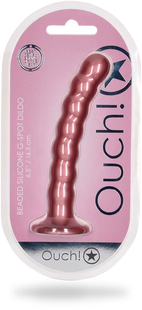 Ein pinker Silikondildo mit strukturierter Oberfläche im Verpackung, beschriftet "Ouch!" und "Beaded Silicone."
