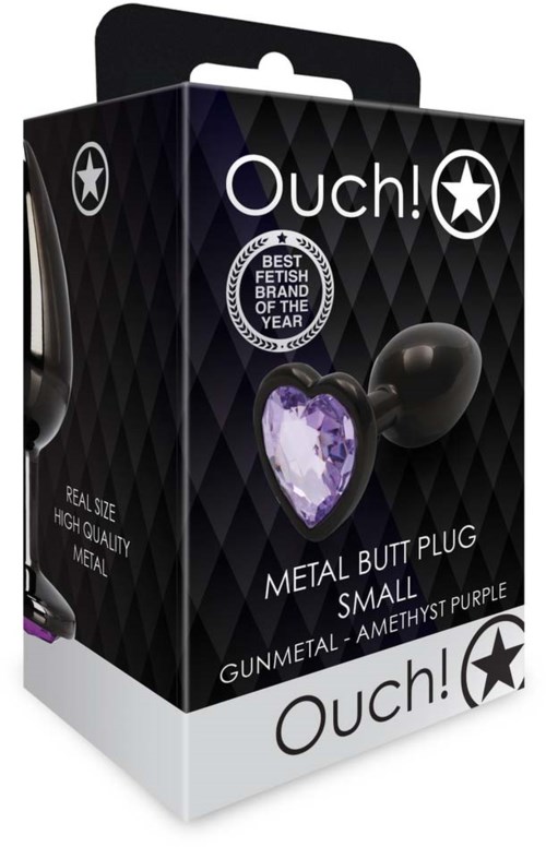 Ein kleiner, purple Herz-Form Metall-Analplug in einer schwarzen und violetten Verpackung, beschriftet mit "Ouch!" und einem Sternlogo.