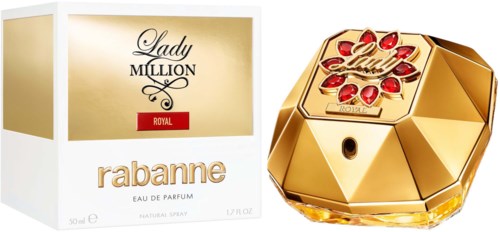 Eine goldene Lady Million Royal Parfümflasche mit roten Edelsteinen und einer passenden Box daneben.