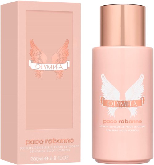 Eine rosa Flasche Paco Rabanne Olympéa Körperspray mit weißen Flügeln und passender Verpackung mit Flügel-Design.