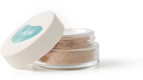 Small glass jar with light brown powder and a white lid with blue label saying 'Please'.