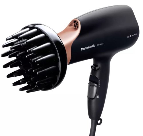 A Panasonic hair dryer with multiple black nozzles attached for styling. It has a black body and a handle with buttons.