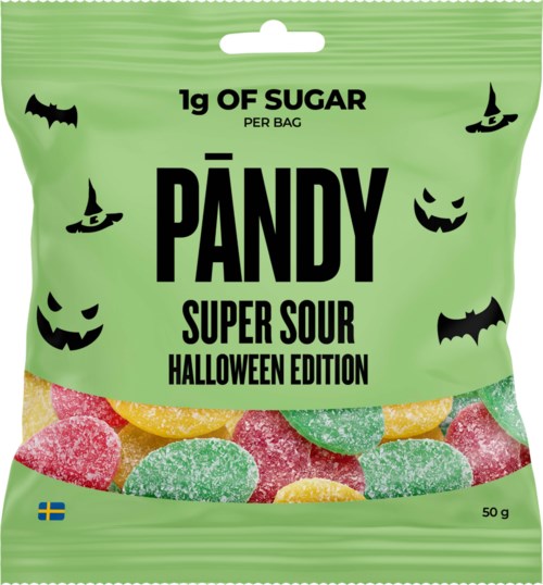 Green Halloween candy bag labeled PANDY Super Sour with bats, witches, and pumpkins, contains colorful sour gummies, 50g.