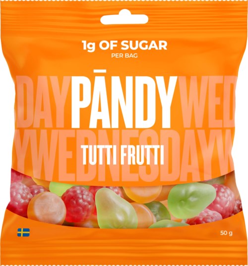 Ljusorange snackspåse med fruktbilder och fet vit och rosa text, inklusive en blå flagga längst ner.