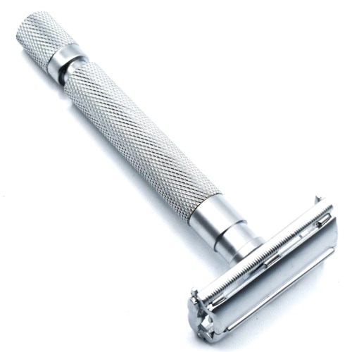 A silver safety razor with a textured handle and a straight razor blade head.