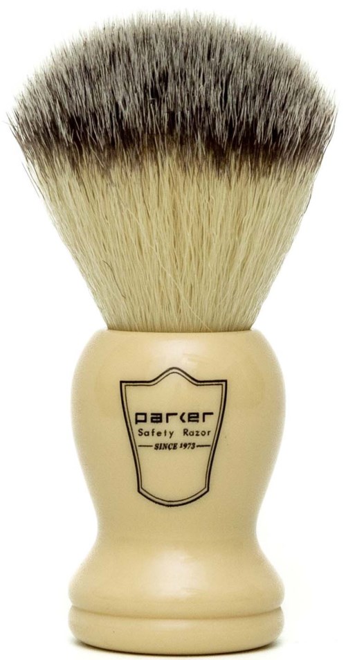 A shaving brush with a cream handle and dense bristles, labeled 'parcer Safety Razor.'