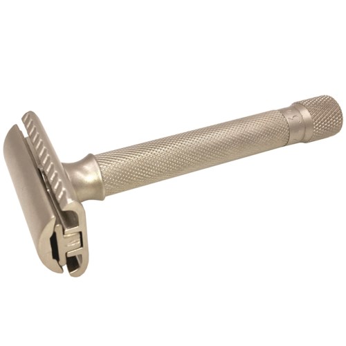 A safety razor with a textured handle and a metal head for shaving.