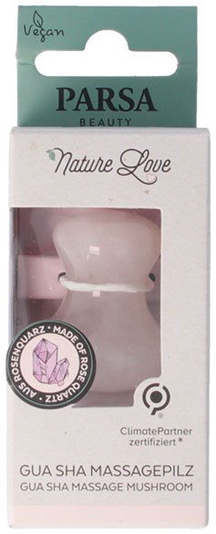 Eine kleine weiße Gesichtsrolle in Verpackung mit grünen, pinken und weißen Farben, mit Text zu vegan, Natur und Massage.
