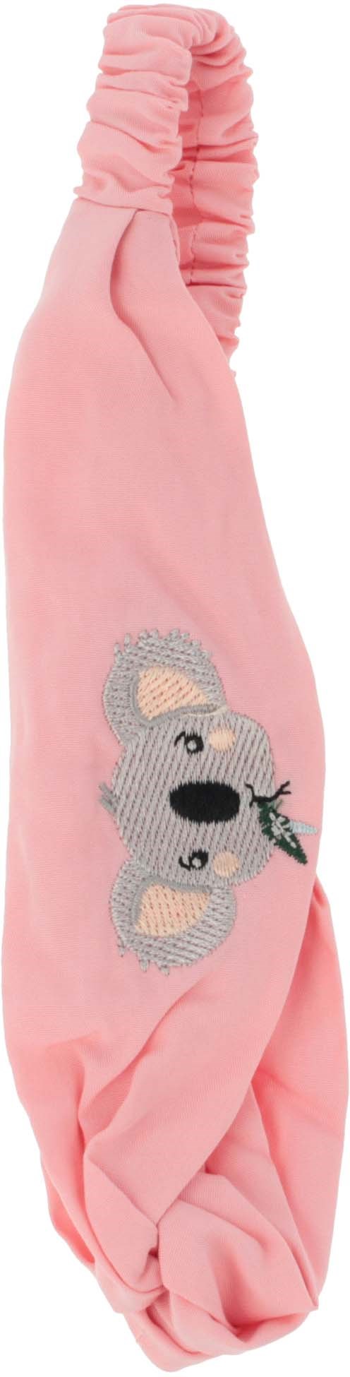 Pinkes Stoff mit Bärenmotiv und kleinem schwarzen Gegenstand im Mund. Elastischer Bund oben. Wahrscheinlich Kinderkleidung oder Accessoire.