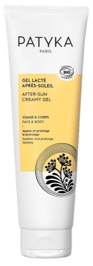 Eine weiße Tube mit der Aufschrift Patyka Paris, eine Lotion für Gesicht und Körper, mit gelbem und schwarzem Design, fördert Beruhigung und Bräunung.