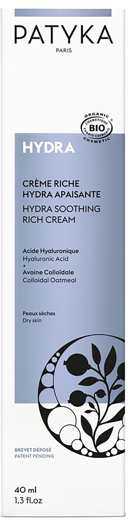 Die Verpackung ist eine weiße und blaue Box mit Textbeschreibung für Hydra beruhigende Reiche Creme für trockene Haut.