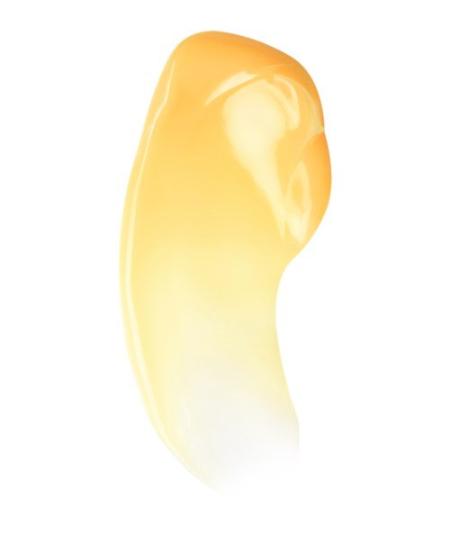 Een gele en witte zeep met een ronde vorm en glanzend oppervlak.