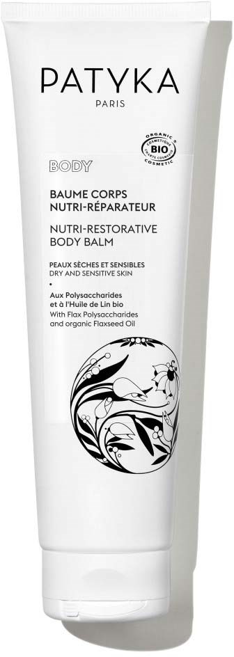 Eine weiße Tube mit Patyka Körperbalsam mit schwarzem Text und schwarz-weißem Blumendesign.