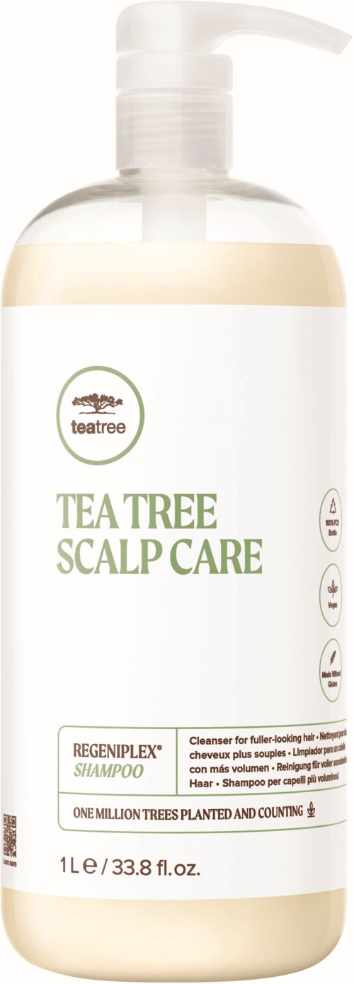 A clear bottle with a pump, labeled 'Tea Tree Scalp Care' shampoo, containing 33.8 fluid ounces.